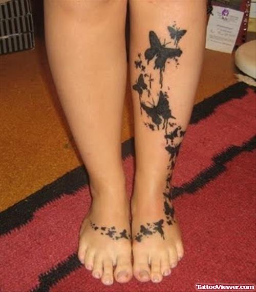 Black Ink Butterflies Feminine Tattoo On Leg