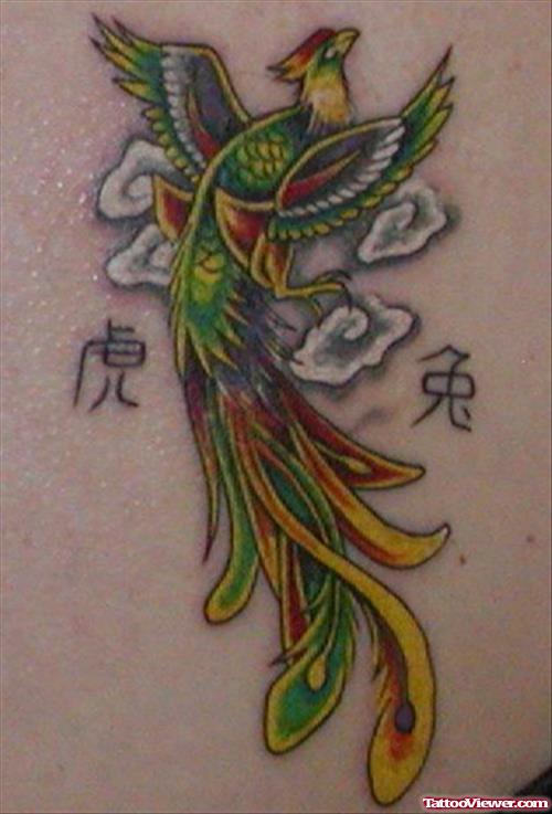 Awesome Colored Phoenix Feminine Tattoo