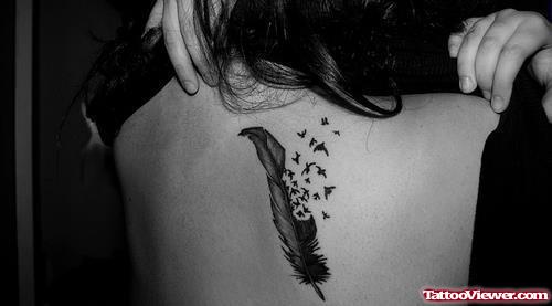 Birds Flying From Feather Feminine Tattoo On Back
