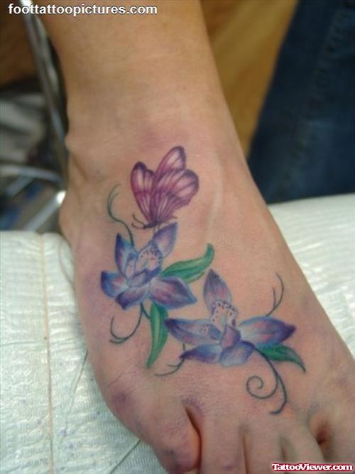 Amazing Colored Flowers Feminine Tattoo On Right Foot