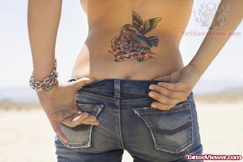 Feminine Tattoo On Lower Back