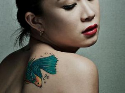 Feminine Tattoo On Back Shoulder