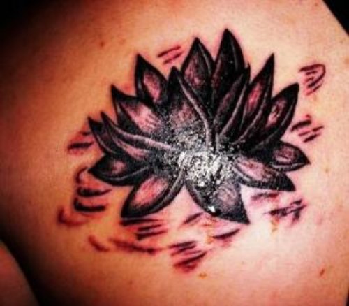 Lotus Flower Feminine Tattoo