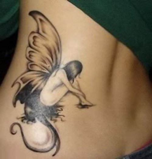 Grey Ink Fairy Feminine Tattoo On Side Rib