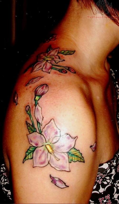 Feminine Flower Tattoo On Right Shoulder