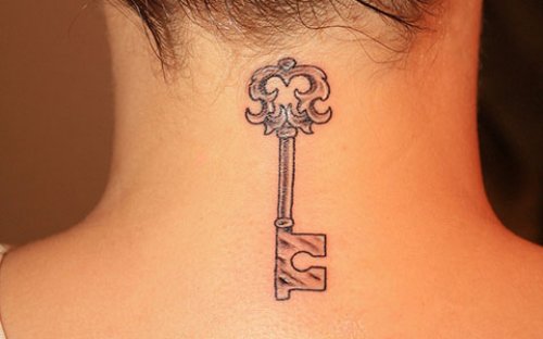 Grey Ink Key Feminine Tattoo On Nape