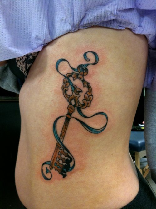 Grey Ink Key Feminine Tattoo On Side Rib