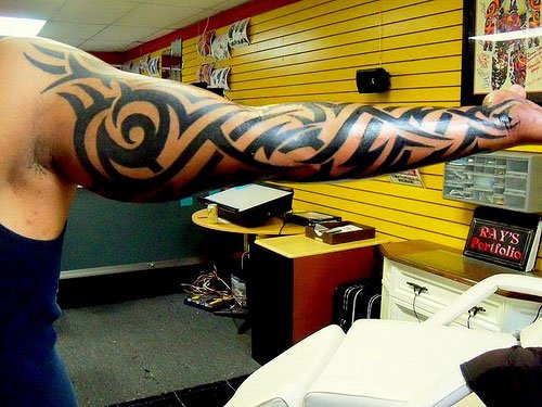 Black Tribal Filipino Tattoo On Sleeve