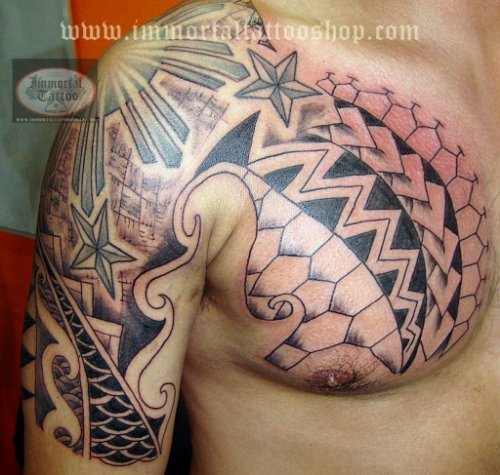 Filipino Tattoo On Man Chest And Right Shoulder
