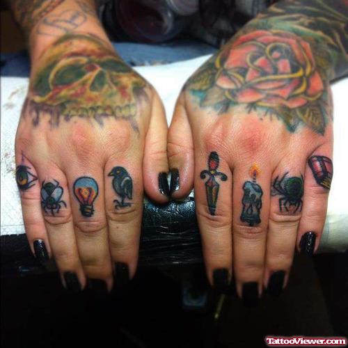 Woman With Colored Symbols Finger Tattoos