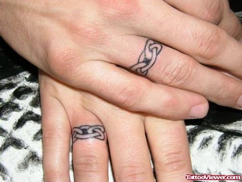 Grey Ink Celtic Finger Tattoo