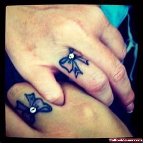 Bow Finger Tattoos