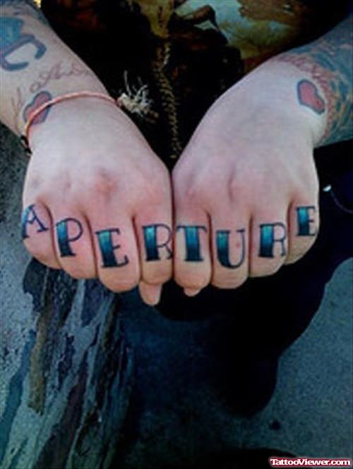 Aperture Finger Tattoos