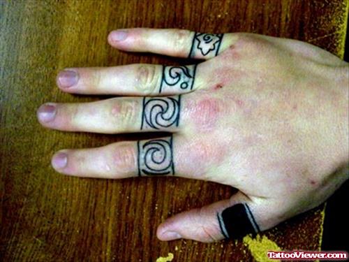 Spiral Symbols Finger Tattoos