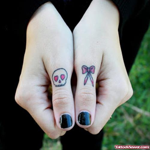 Small Skull And Bow Finger Tattoos For Girls