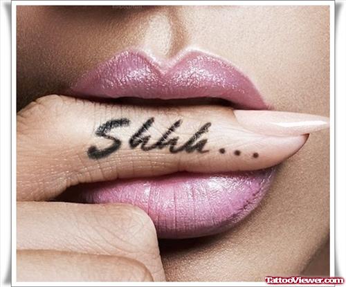 Girl With Shhh Finger Tattoo
