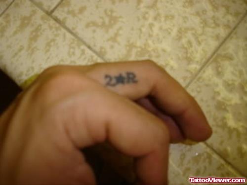 Star Finger Tattoo