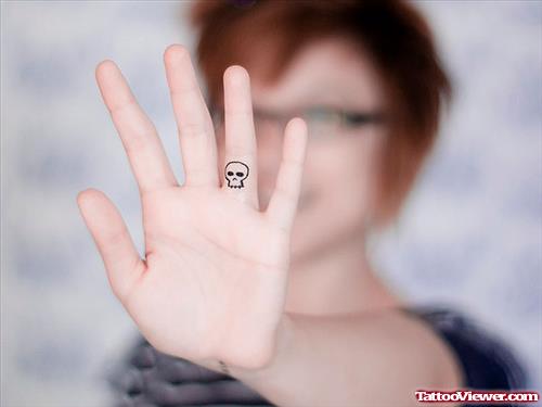Small Skull Finger Tattoo For Girls