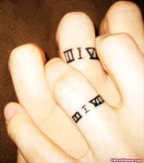 Roman Numeric Symbols Finger Tattoos