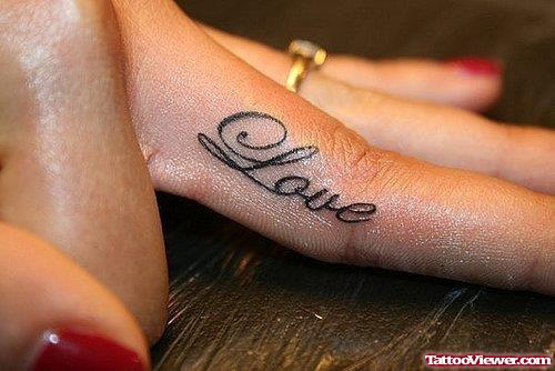 Girl With Love Finger Tattoo