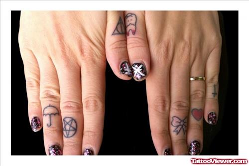 Beautiful Symbols Finger Tattoos