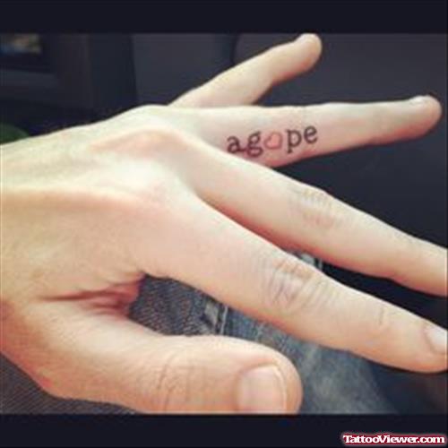 Agope Finger Tattoo