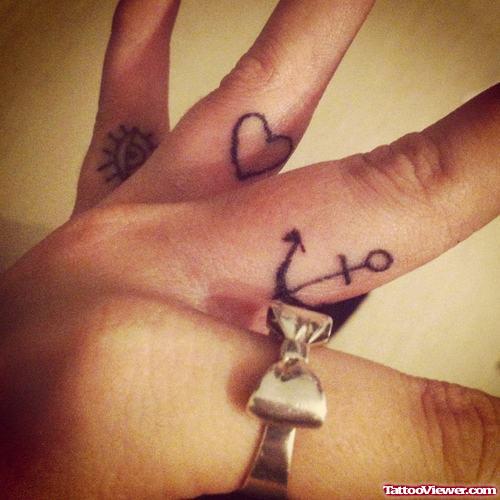 Tiny Heart And Anchor Finger Tattoos