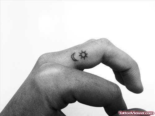 Star And Moon Finger Tattoo