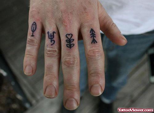 Guy Showing His Finger Tattoos