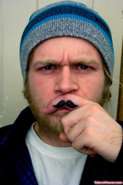 Men With Finger Mustache Tattoo