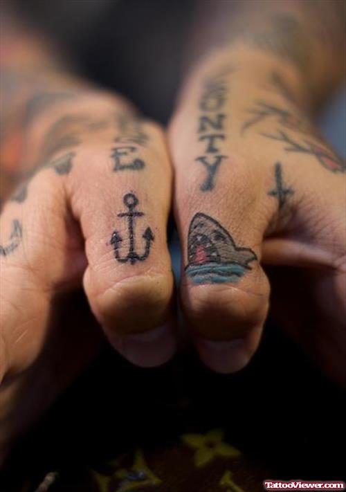 Black Ink Anchor And Shark Head Finger Tattoo