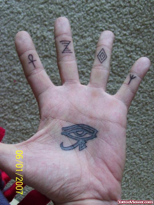 Ankh And Egyptian Eye Finger Tattoo