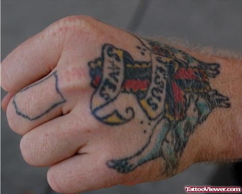 Outline Crest Finger Tattoo