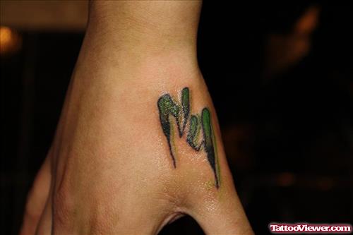 Green Ink Alphabets Finger Tattoos