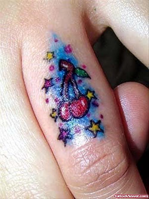 Colored Stars And Cherry Finger Tattoos
