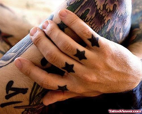 Black Stars Finger Tattoos