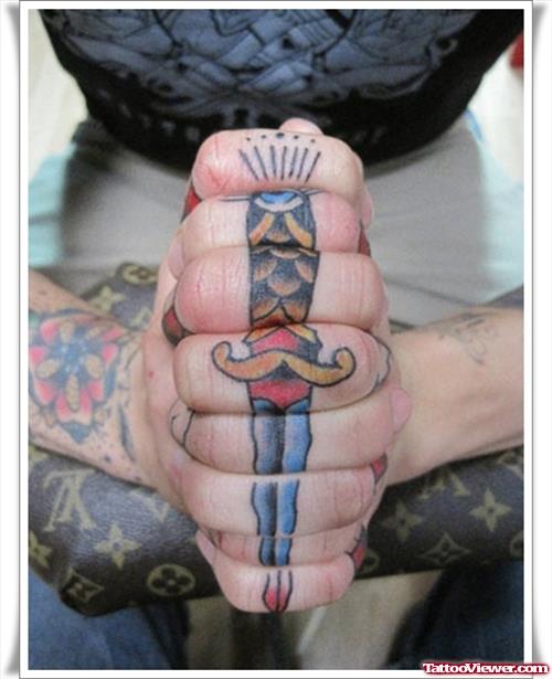 Colored Dagger Finger Tattoos