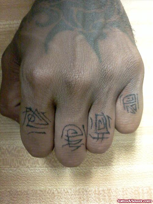 Chinese Symbols Finger Tattoo