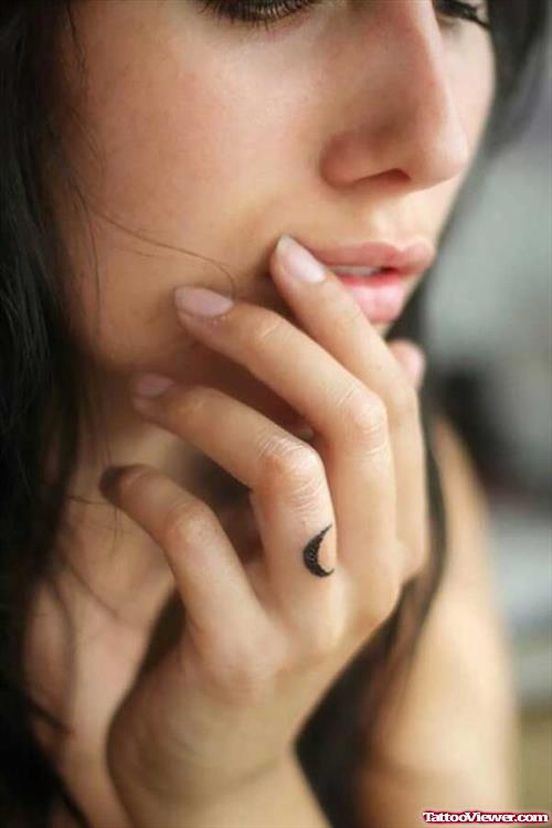 Black Ink Small Moon Finger Tattoo