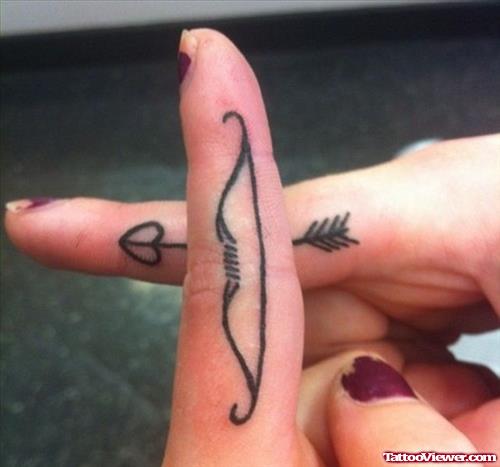 Bow And Arrow Finger Tattoos
