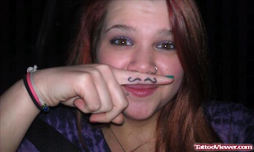 Awful Girl With Mustache Finger Tattoo