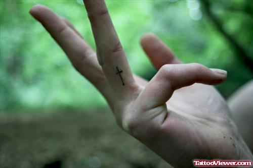 Beautiful Small Cross Finger Tattoo