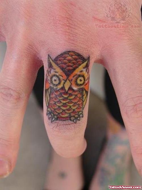 Tiny Owl Tattoo On Finger