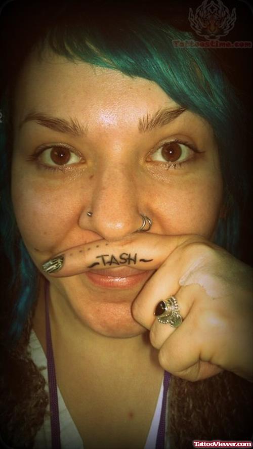 Tash Tattoo On Finger