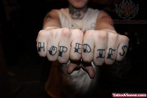 Hope Dies Tattoo On Finger
