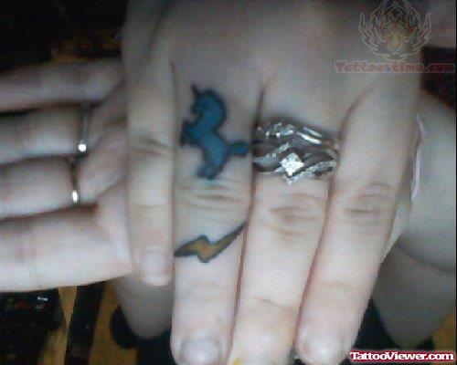 Blue Horse Tattoo on Finger
