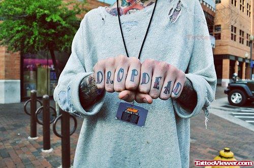 Drop Dead Finger Tattoos