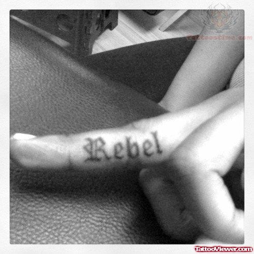 Rebel Tattoo On Finger