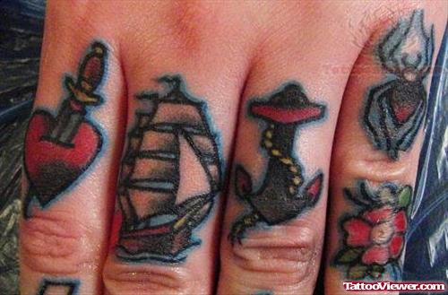 Heart Dagger And Sailor Tattoo On Fingers