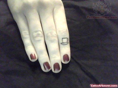 Small Tea Cup Tattoo On Finger